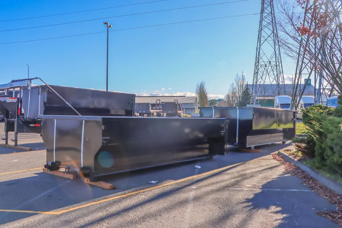 Roll-off dumpster ready for waste disposal at job site for Yard Waste Dumpster Rental in Longview
